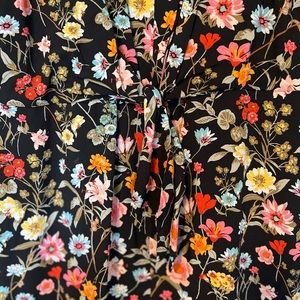 Ann Taylor Loft sleeveless jumpsuit with pockets and tie front - Size 4